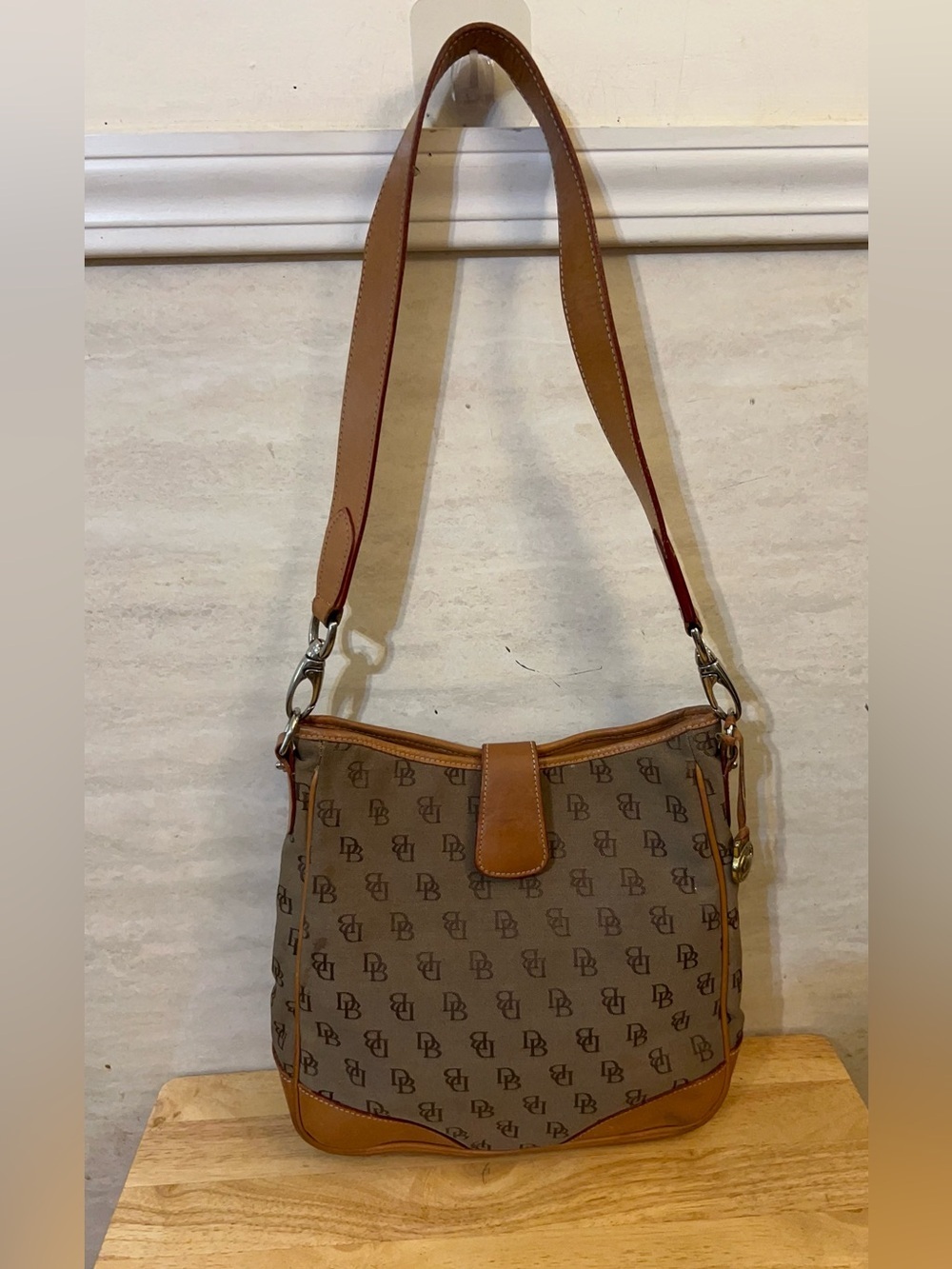 Dooney & Bourke Crescent Shoulder Bag. Canvas Monogrammed Pattern